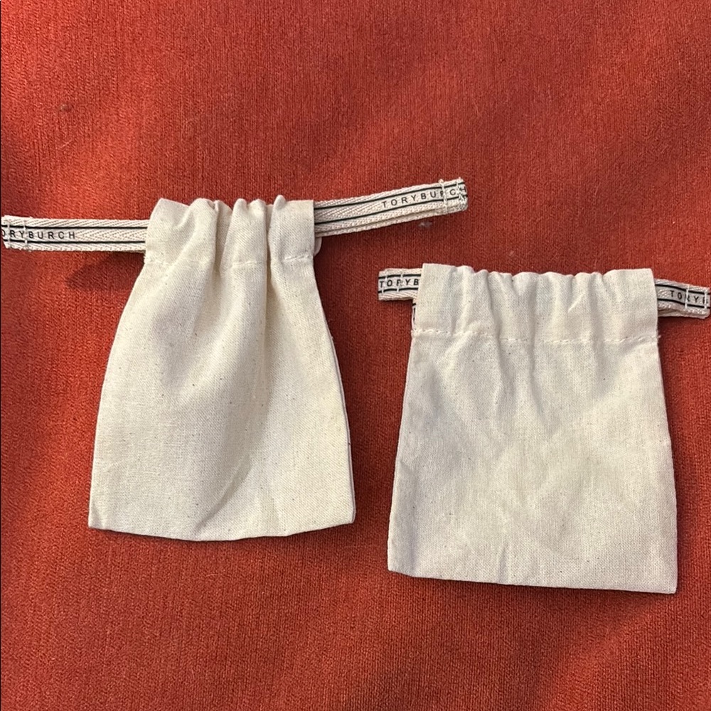 Tory Burch Ivory Drawstring Bags